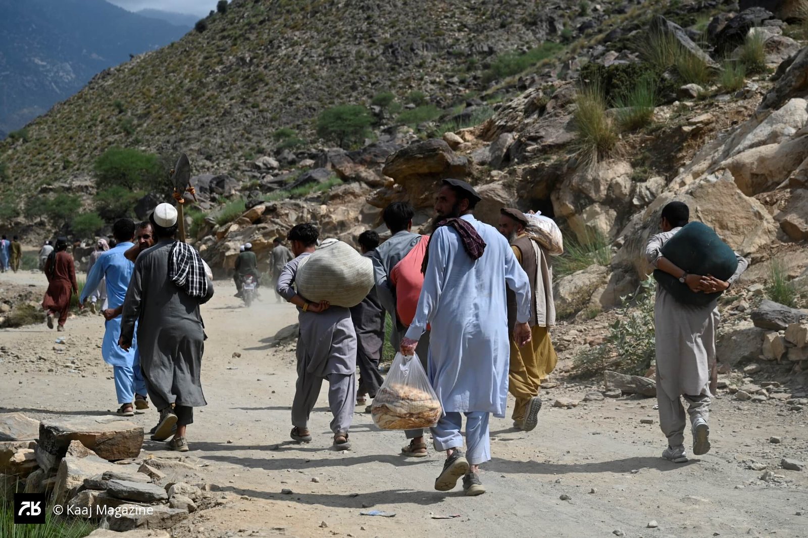 In Vadir village, blocked mountain roads made rescue efforts an exhausting journey. Photographed by Kaaj Magazine.
