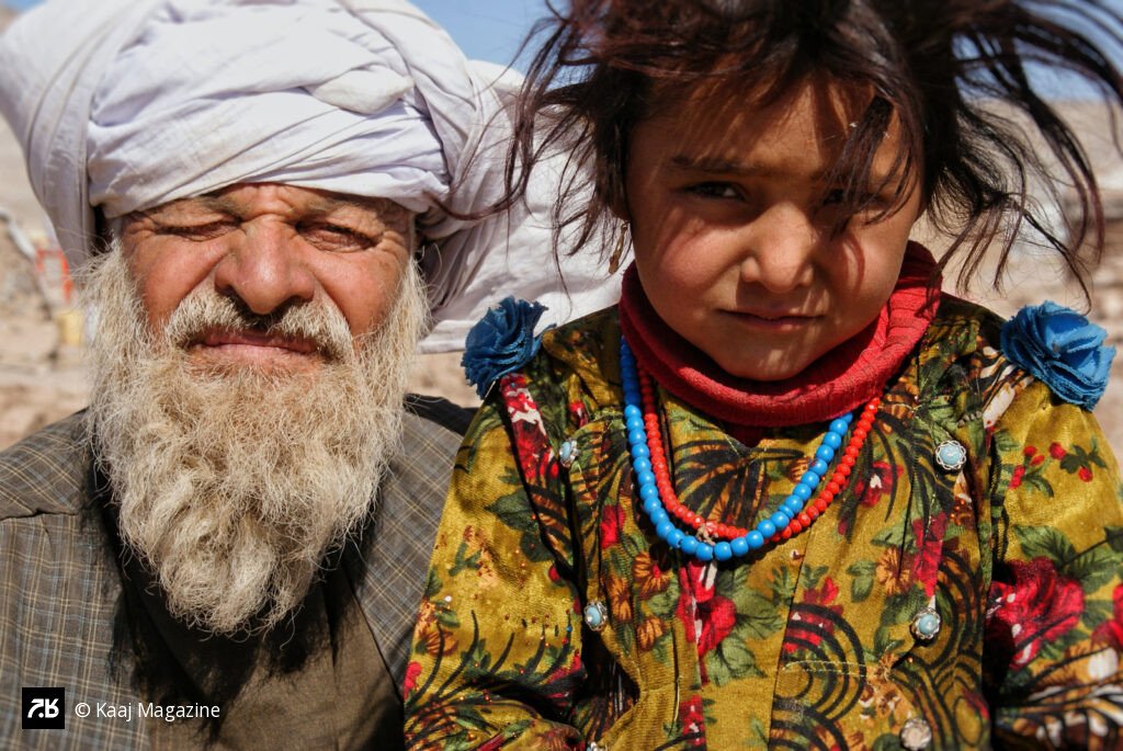 Elderly man and young girl together