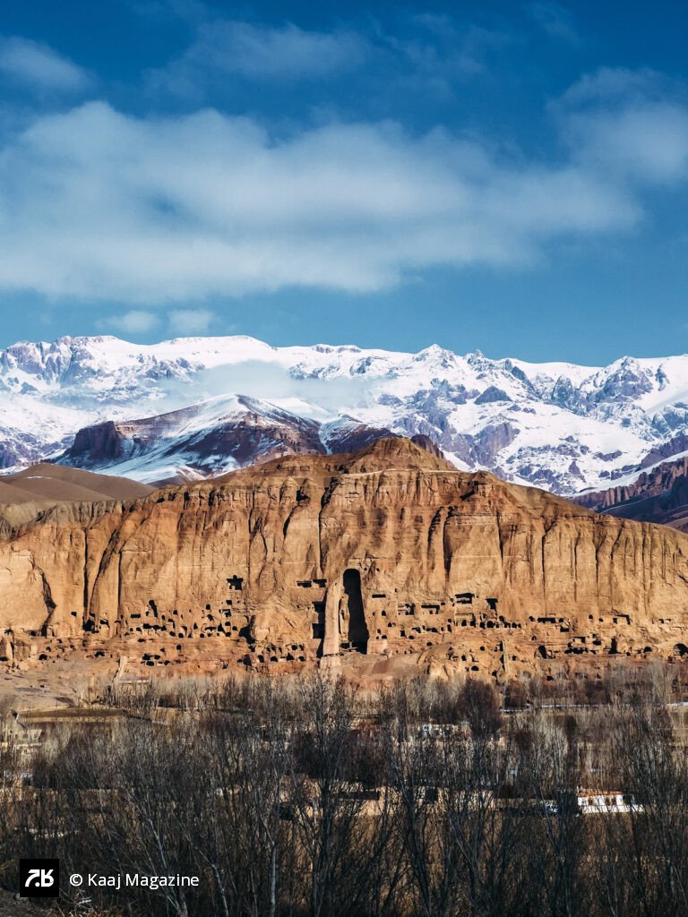 Bamiyan cliffs and snow-capped mountains